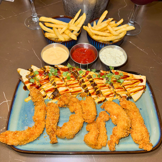 Picada Mixta con Tenders y Quesadillas + 2 Orden de Papitas + Cubetazo de 8 Coronitas + 2 Sangrías por $22 en VICE