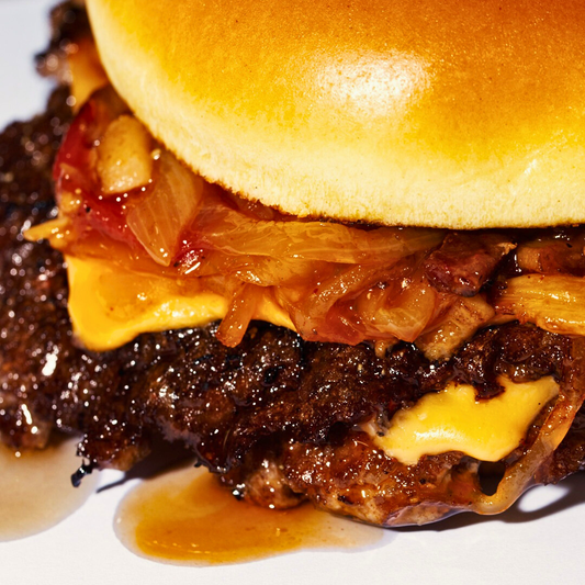 2 Burgers Oklahoma + 2 Papas Fritas + 2 Sodas por solo $14 en BunzBite