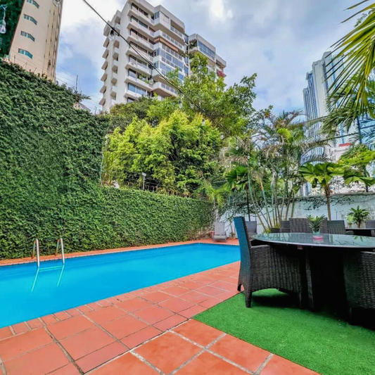 Pasadía con Piscina para 2 personas + Cubetazo Nacional por $20 en Yoha Hostal