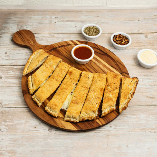 4 Pizzas Personales o Calzone + 1 Palitroque Relleno + 4 Refrescos + 4 Copas de Helado por $22 en Valenti’s