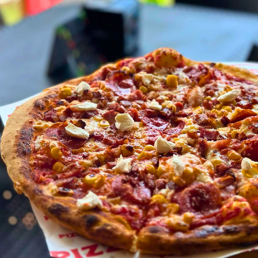 2 Pizzas Clásicas o Premium + 2 Sodas desde $12 en Pizzarella Clayton