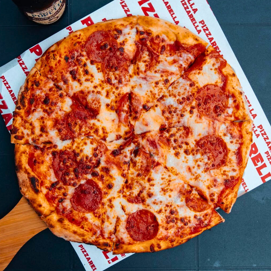 2 Pizzas Clásicas o Premium + 2 Bebidas desde $12 en Pizzarella Vía Israel