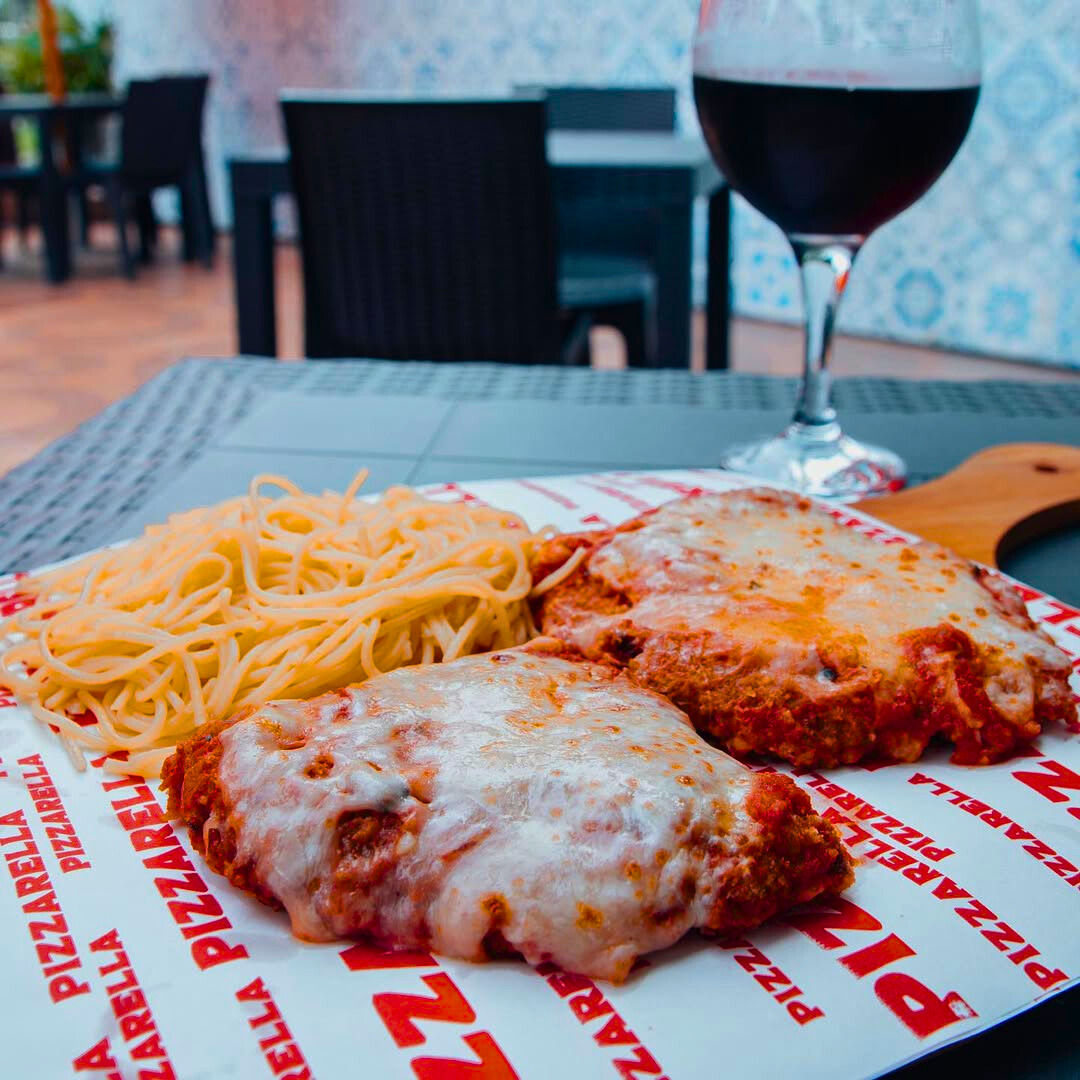 Paga $12 y disfruta $20 en el menú de comidas y bebidas en Pizzarella Vía Israel