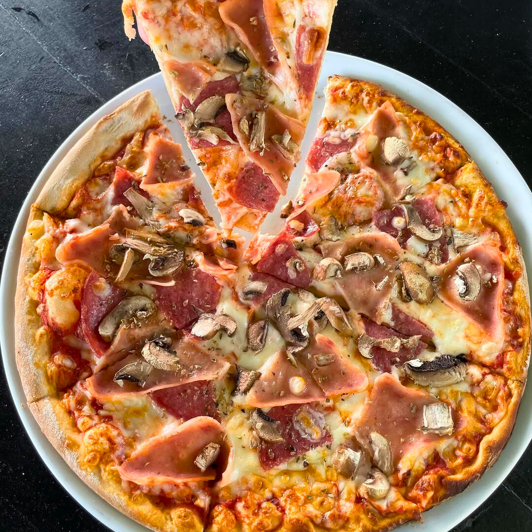 Pagas $10 y consume $20 en el menú de comida y bebidas en Pizzería Mi Casita