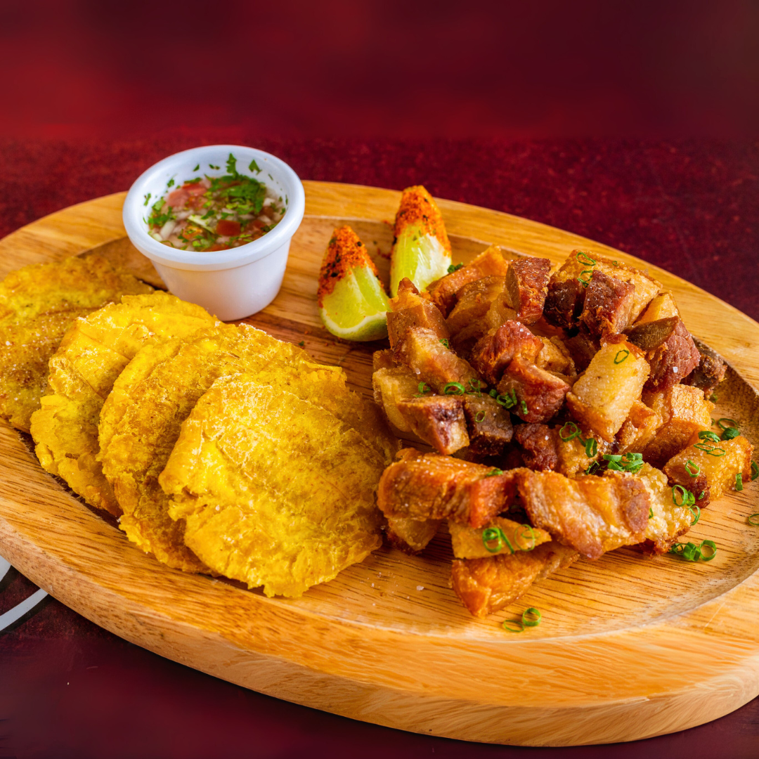 Orden de Chicharrones con Patacones + 2 Órdenes de Tostones con Ropa Vieja + 2 Bebidas por $20 en Carpe Diem Terrace
