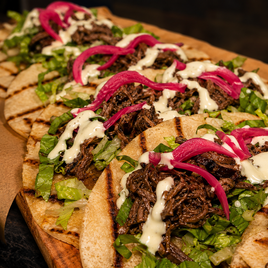12 Tacos Variados + Plátanos Artesanales + 2 Cubetazos de Coors o 3 Margaritas por $20 en La Fábrica