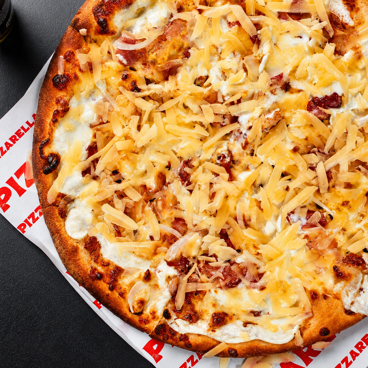 Pizza Familiar + 4 Cervezas Nacionales por solo $17 en Pizzarella Costa del Este
