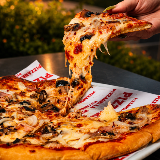 Pizza Familiar + 4 Cervezas Nacionales por solo $17 en Pizzarella Costa del Este