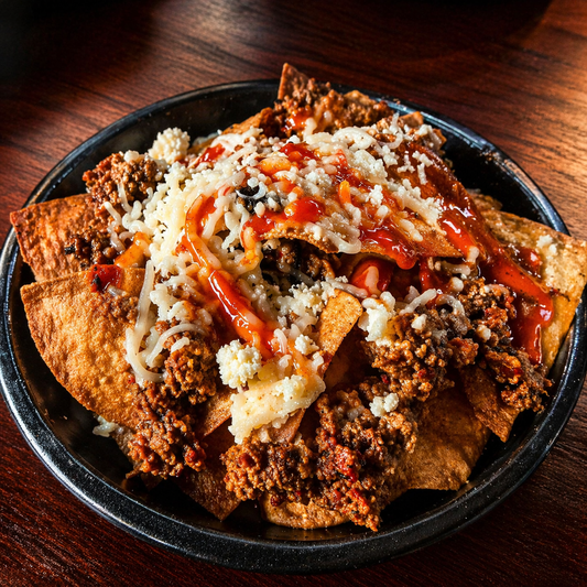 2 Burgers + 8 Alitas + Súper Nachos + 2 Sodas por solo $15 en Bokattos