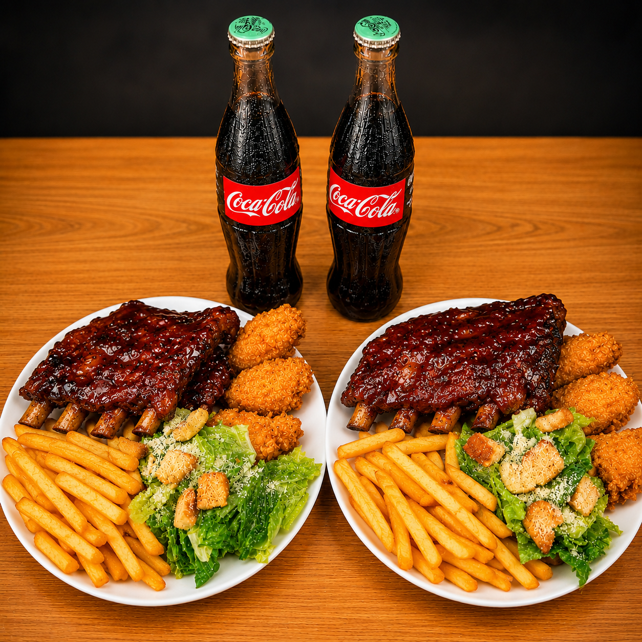 2 Platos con Costillas BBQ, Alitas, Papas Fritas y 2 Bebidas por $15 en Alitas Salvajes Pub