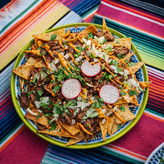 2 Burritos + Chilaquiles de Birria + 2 Elotes + 2 Electric Lemonade por $19 en La Taquerita