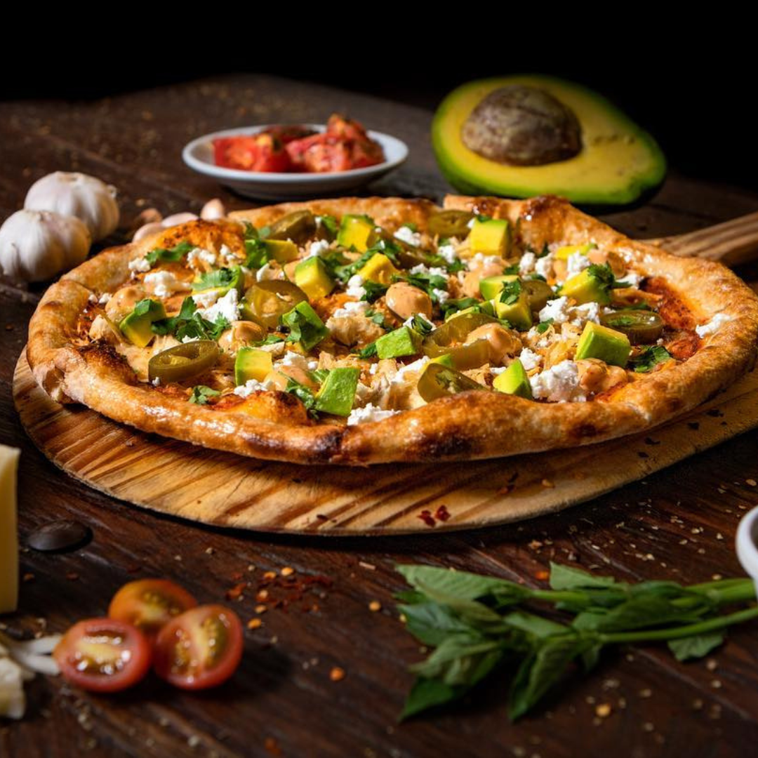 Jarra De Cerveza Clásica + Pizza desde $20 en La Rana Dorada de Condado del Rey