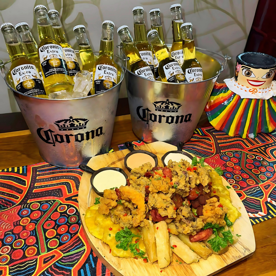 Picada Mar y Tierra + 2 Cubetazos de Cerveza Corona por $18 en La Divina Comida