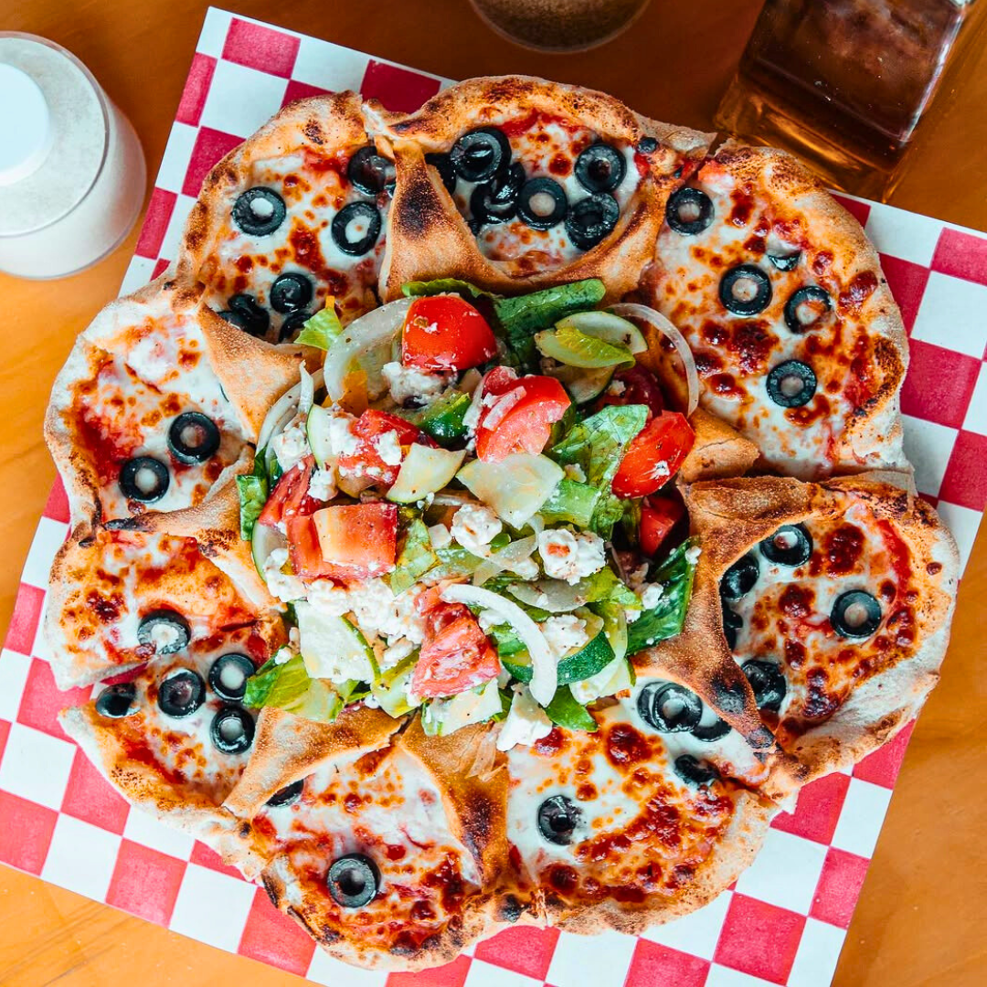 Paga $12 y disfruta $20 en el menú de comidas y bebidas en Pizzarella Clayton