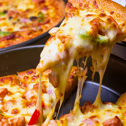 Pizza de 12" + Entrada para Compartir + 2 Refrescos + 2 Copas de Helado para compartir por solo $15 en Valenti’s