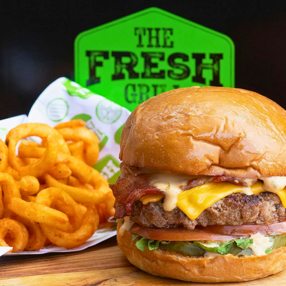 2 Burgers del Menú + Canasta de Papas Cheddar Bacon + 2 Sodas o Sangría por $15 en The Fresh Grill