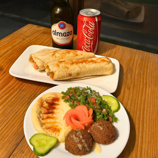 2 Shawarmas de Pollo + Hummus + 2 Falafel + Tabulé + 2 Sodas o Cervezas por $15 en Shawarma Damasco