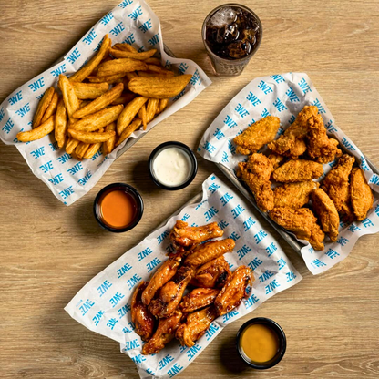 20 Wings o Boneless + 2 Sides + 2 Quesadillas + 2 Sodas Refill por $25 en Wing Zone El Dorado