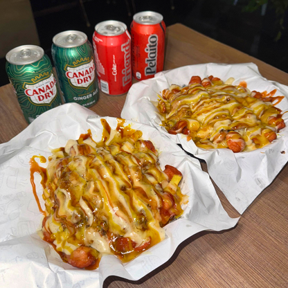 2 Salchipapas Signature + 4 Sodas o Cervezas por $15 en Asados La Loca del Cuero