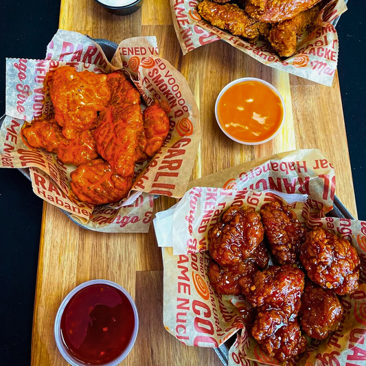 20 Wings o Boneless + 2 Sides + 2 Quesadillas + 2 Sodas Refill por $25 en Wing Zone El Dorado