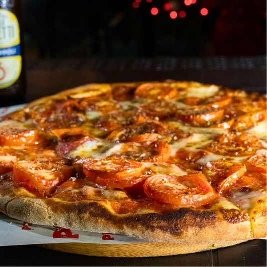 2 Pizzas Clásicas o Premium + 2 Bebidas desde $12 en Pizzarella