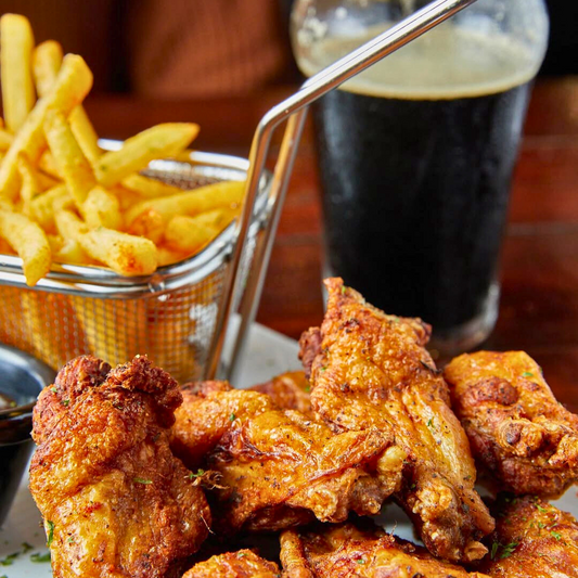Jarra de Cerveza Artesanal + Combo de Wings + Papas por $17 en Independiente Barra Artesanal