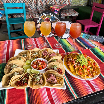 Bandeja de 12 Tacos Mixtos + Orden de Nachos Medianos + 4 Jugos por $20 en La Mexicana Grill & Taquería