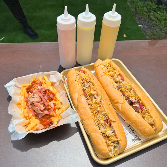 2 Pepitos Mixtos de 30cm  + Papas con Queso, Chilli y Bacon por $8 en Belhaj Tasty Food