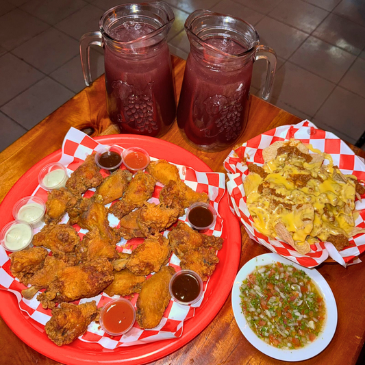 20 Alitas + Nachos de Carne + 2 Jarras de Sangría por $15 en Changchos Sport Bar