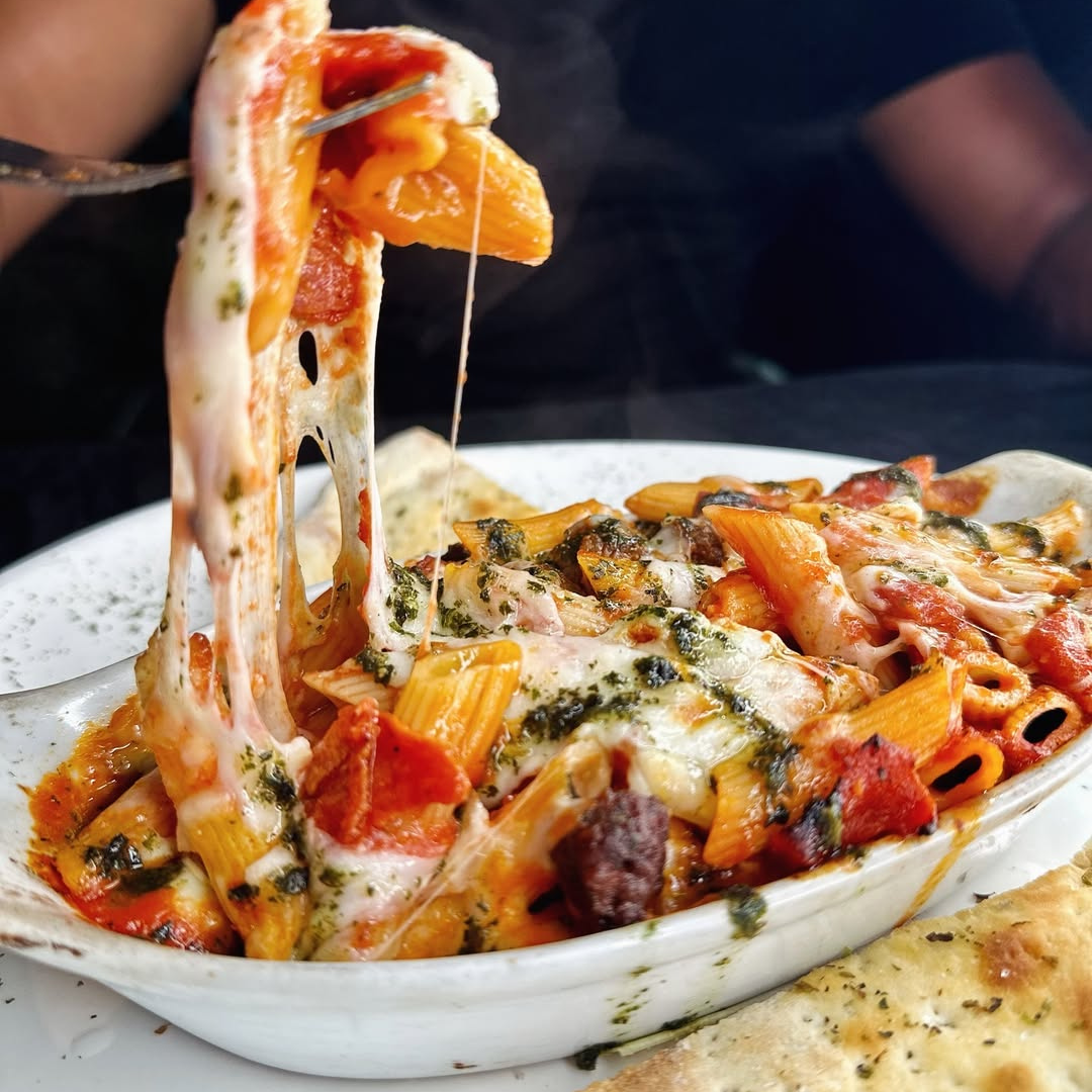 Pagas $10 y consume $20 en el menú de comida y bebidas en Pizzería Mi Casita