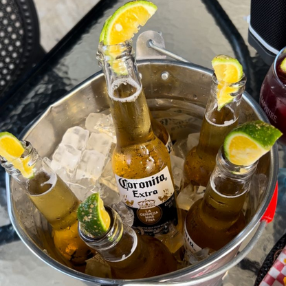 Picada Mar y tierra + Cubetazo de 8 Coronitas o Jarra de Sangría por $20 en Amor al Fuego