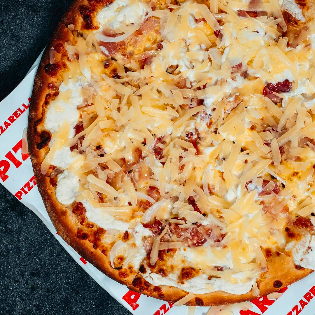 2 Pizzas Clásicas o Premium + 2 Bebidas desde $12 en Pizzarella Vía Israel