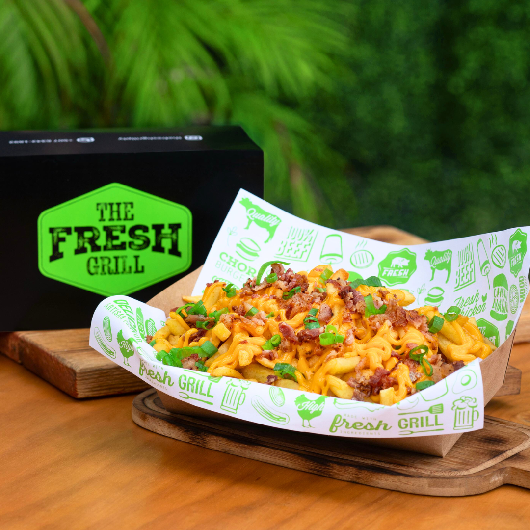 2 Burgers del Menú + Canasta de Papas Cheddar Bacon + 2 Sodas o Sangría por $15 en The Fresh Grill