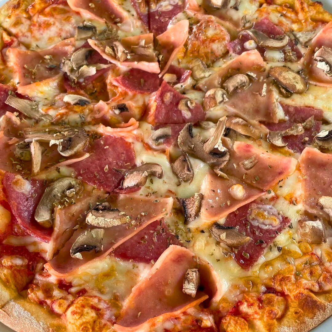 Pagas $10 y consume $20 en el menú de comida y bebidas en Pizzería Mi Casita