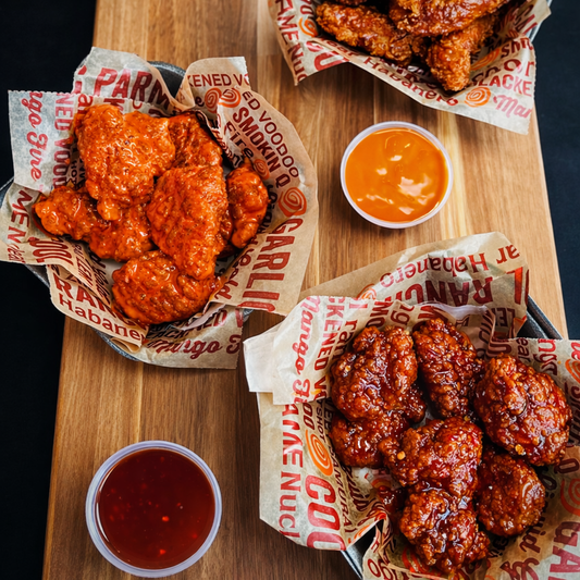 20 Wings o Boneless + 2 Quesadillas + 2 Sides + 2 Sodas por $25 en Wing Zone El Dorado