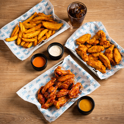 20 Wings o Boneless + 2 Quesadillas + 2 Sides + 2 Sodas por $25 en Wing Zone El Dorado