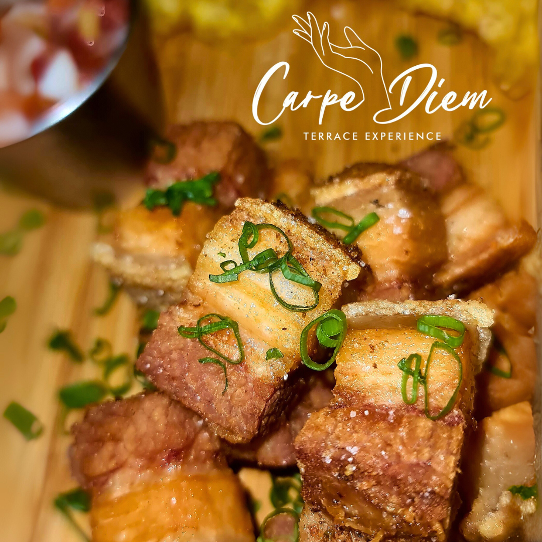 Orden de Chicharrones con Patacones + 2 Órdenes de Tostones con Ropa Vieja + 2 Bebidas por $20 en Carpe Diem Terrace