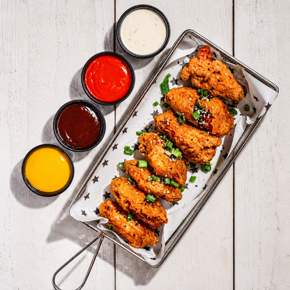 All You Can Eat de Wings, Tenders y Hamburguesitas para 2 por $20 en Beauty and the Butcher