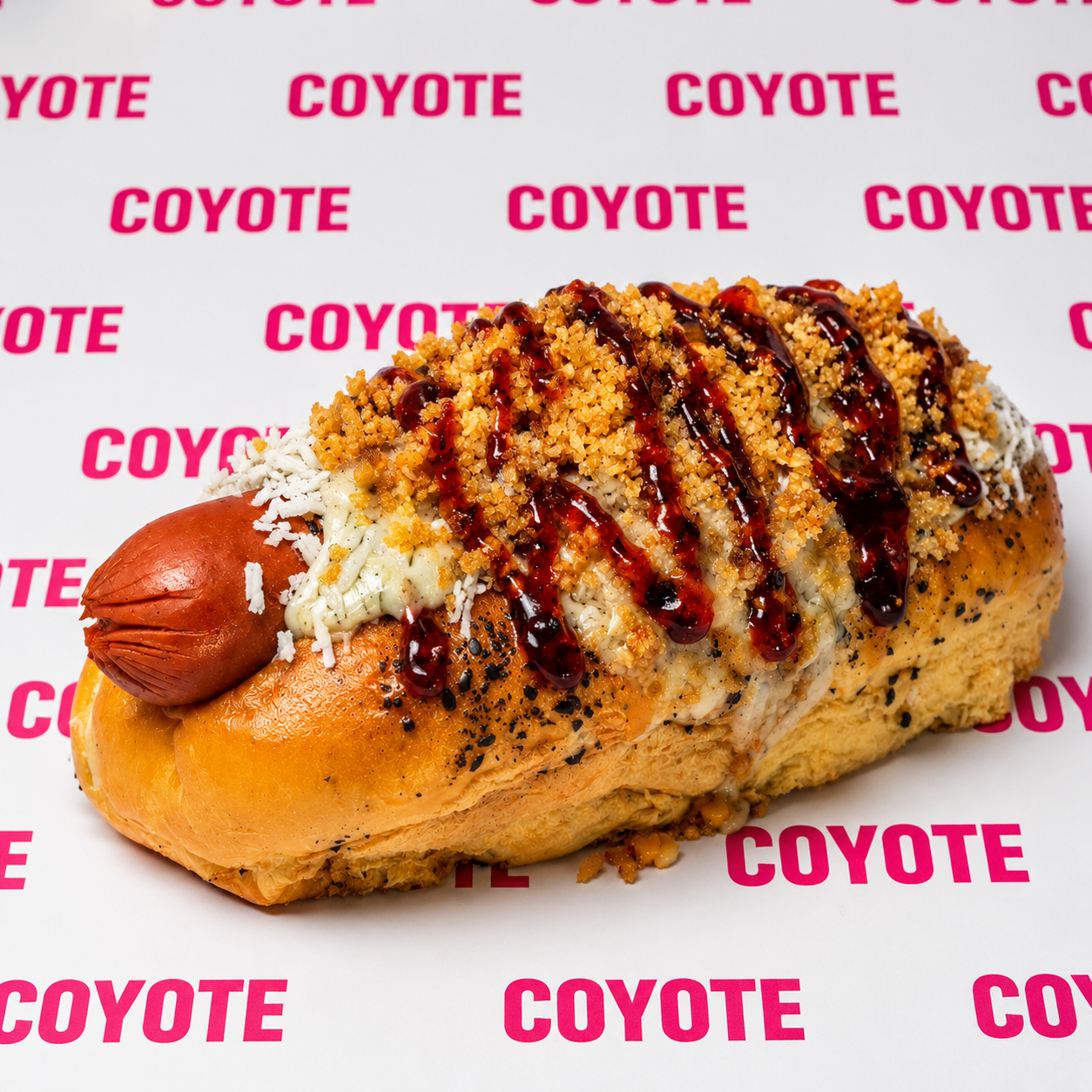2 Coyote Dogs + 2 Elotes + 2 Bebidas desde $15 en Coyote Brisas del Golf