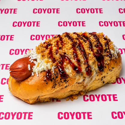 2 Coyote Dogs + 2 Elotes + 2 Bebidas desde $15 en Coyote Brisas del Golf