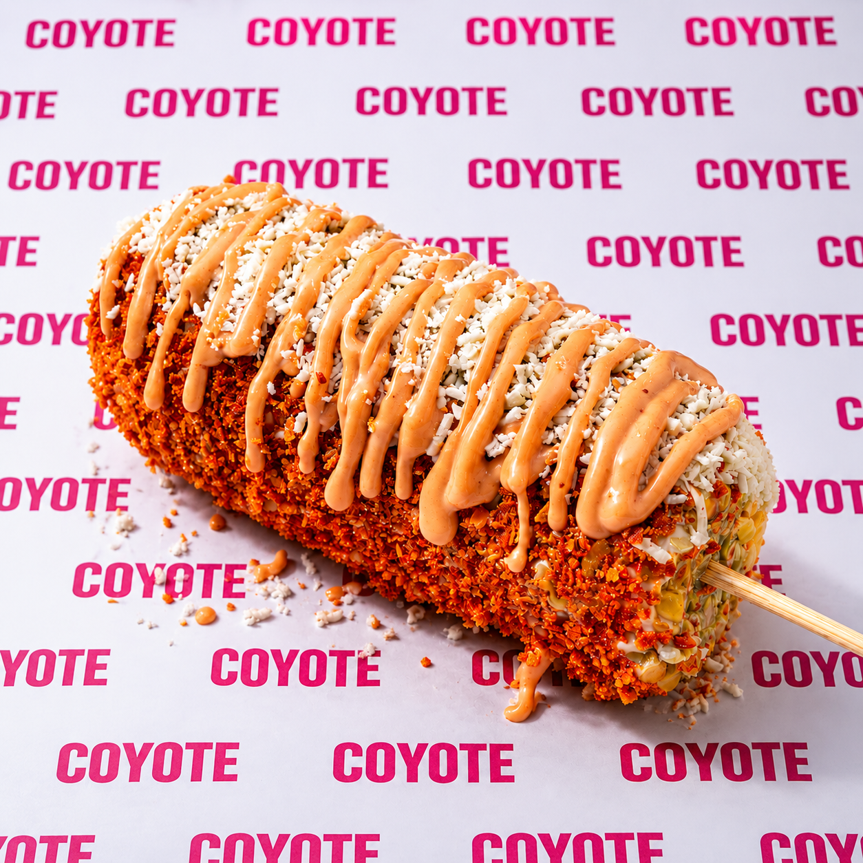 2 Coyote Dogs + 2 Elotes + 2 Bebidas desde $15 en Coyote Brisas del Golf