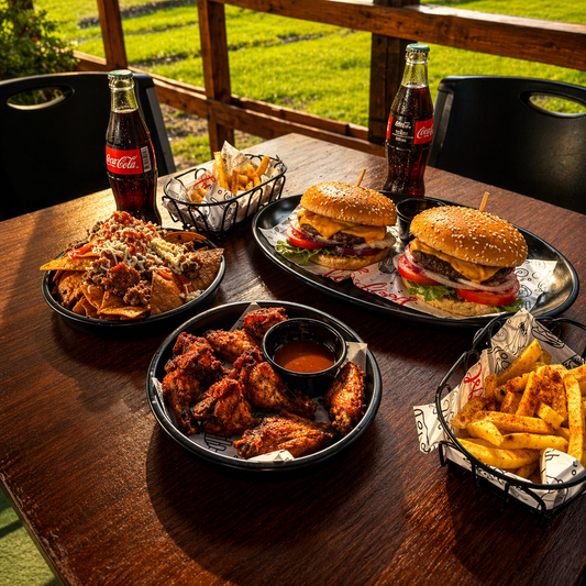 2 Burgers + 8 Alitas + Súper Nachos + 2 Sodas por solo $15 en Bokattos