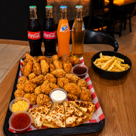 Family Pack: 25 Alitas + 25 Boneless + Quesadilla + Papas + 4 Bebidas por $30 en Alitas Salvajes Pub
