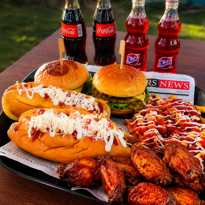 2 Burgers de Carne + 2 Hot Dogs Jumbo, Wings y 4 Sodas por solo $15 en Bokattos