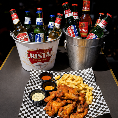10 Alitas + Acompañamiento + Media Caja de Cerveza Nacional por solo $15 en Lost Exclusive