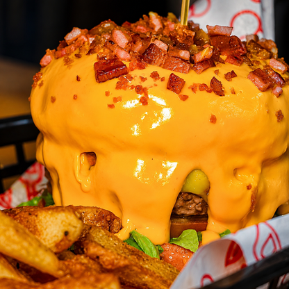 2x1 en Cheese Bacon Burger con Papas por $13.25 en Alitas Salvaje Pub
