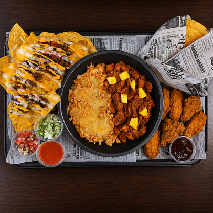 Bandeja para 2 con Tacos, Alitas, Nachos y 2 Bebidas por solo $18 en Alitas Salvajes Pub