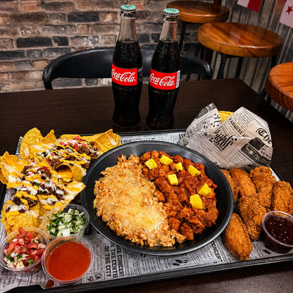 Bandeja para 2 con Tacos, Alitas, Nachos y 2 Bebidas por solo $18 en Alitas Salvajes Pub