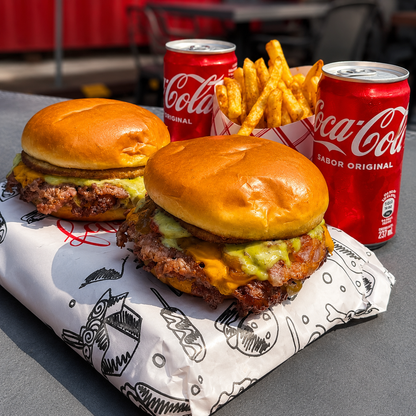 2 Burgers a elegir + Papitas Fritas + 2 Sodas por $9 en Temptation Burger