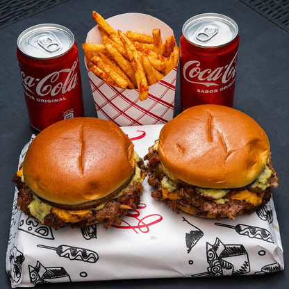 2 Burgers a elegir + Papitas Fritas + 2 Sodas por $9 en Temptation Burger